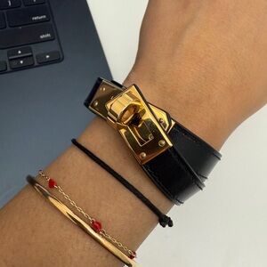Hermes - Black and Gold Women's Bracelet comes with box
